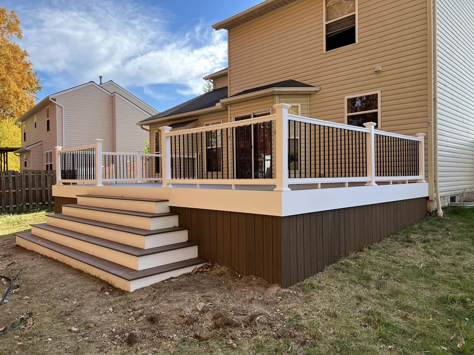Home with a new white deck and stairs